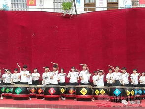 新豐鎮(zhèn)第二初級中學 陽光文化大巴鼓樂項目捐贈儀式暨開團典禮大會 火熱舉行